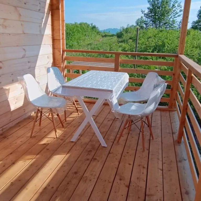 Дома для отдыха "Ипиней" С видами на домашние вулканы, город, бухту