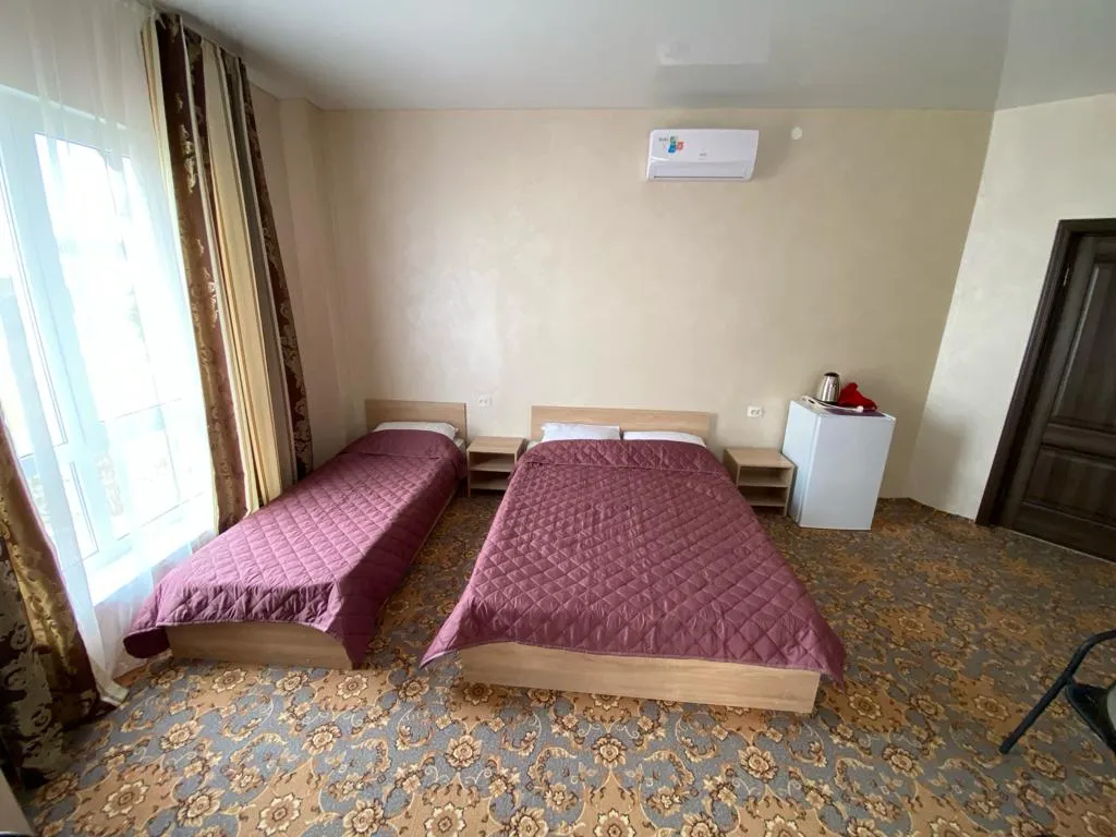 Трёхместный Де Люкс с балконом