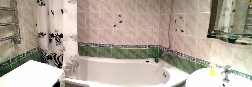 Квартира с двуспальной кроватью и диванчиком