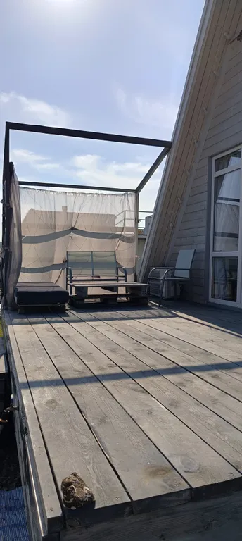 Тpеугольный дом A-frаmе с видом на море