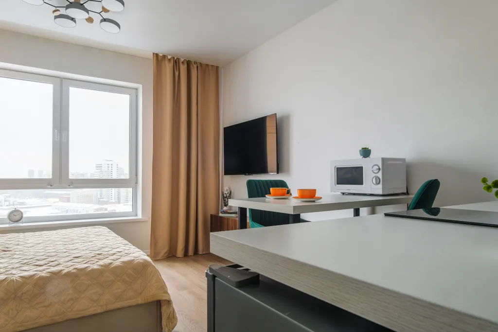 Квартира Квартира Просторная студия в теплых тонах — Екатеринбург