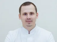 Николай