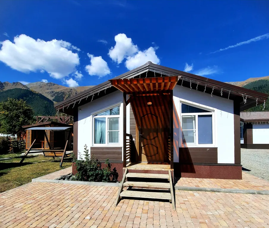 Коттедж Трёхкомнатные апартаменты с видом на горы — Архыз