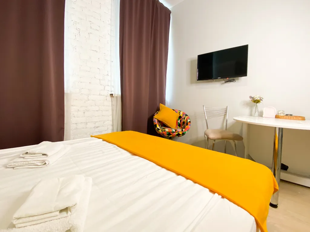 Уютные апартаменты-студио Солнечный Питер на Гончарной улице