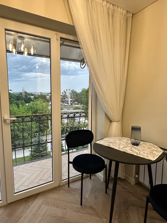 Уютная квартира в центре города с прекрасными рассветами и закатами