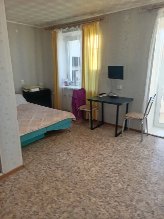 Уютная гостиная с лоджией