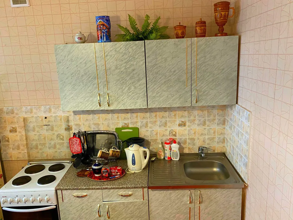 Дом с часами на площади Партизан