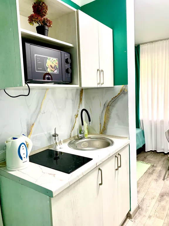 Уютная студия в зелёном районе с отличной локацией