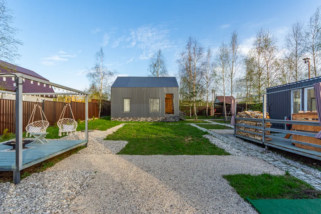 Дом с купелью и сауной, костровой зоной, мангалом и качелями