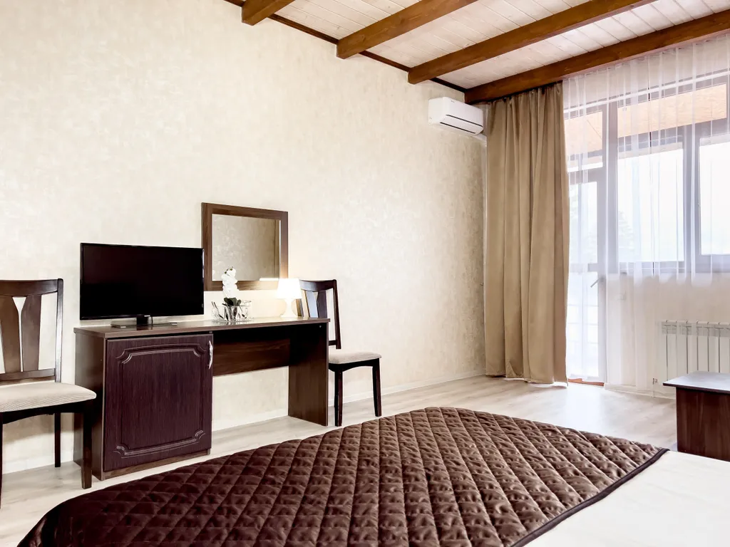 Люкс с видом на горы и балконом