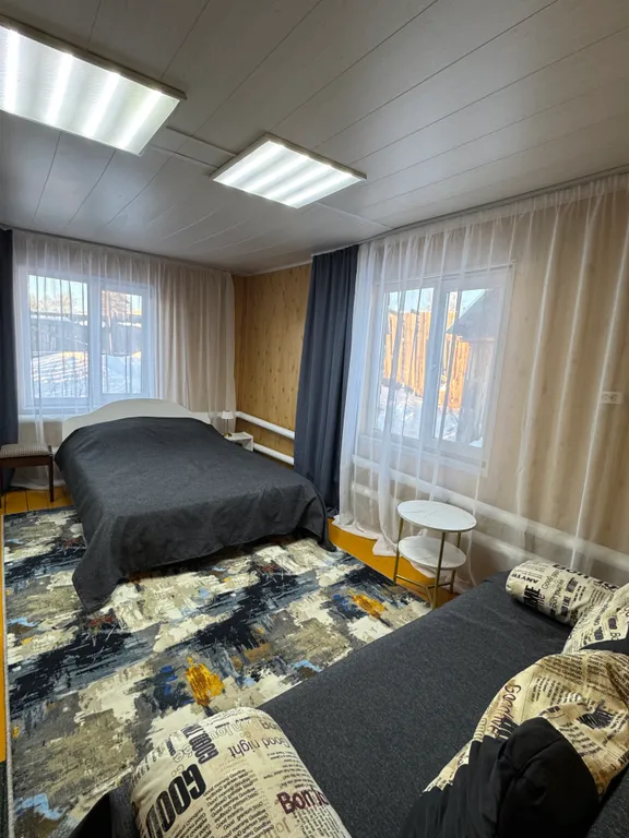 Отдельный уютный бревенчатый дом с баней в Абзаково