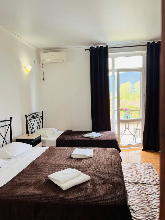 Двухместный номер с двумя раздельными кроватями и включенным завтраком