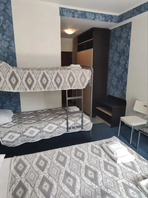 Номер на пятом этаже с видом на горы