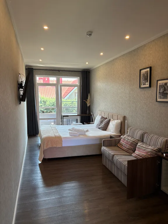 Квартира Делюкс, комната апартамент с балконом/террасой вид на горы, территорию — Сириус