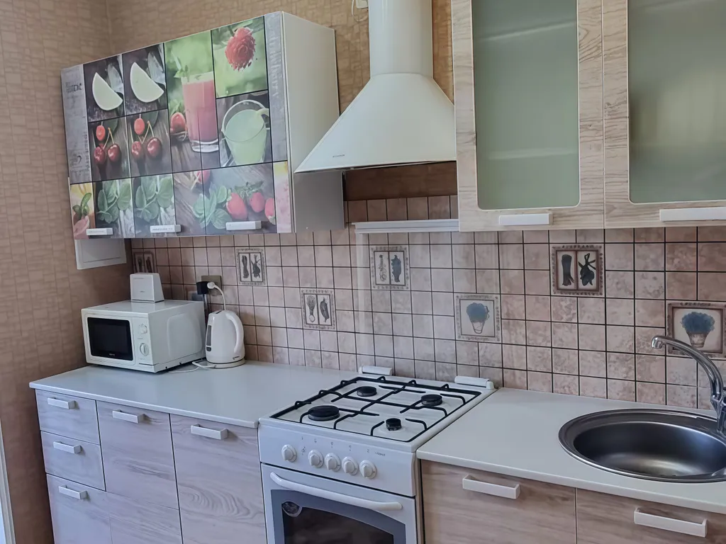 Уютная квартира на Победы с расширенной кухонной зоной (Уютный Дом)