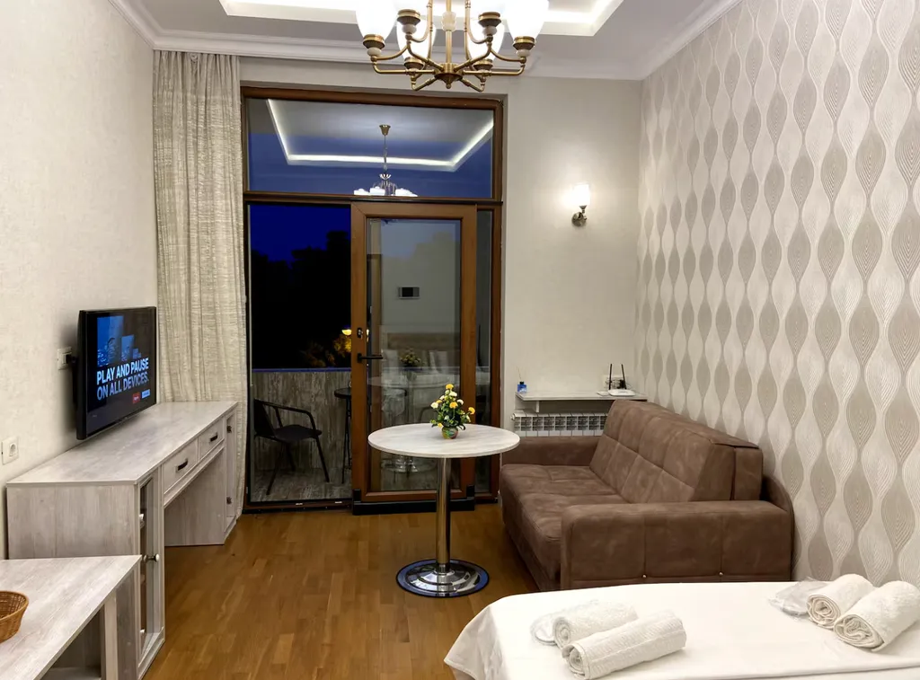 Апартаменты с видом на бульвар