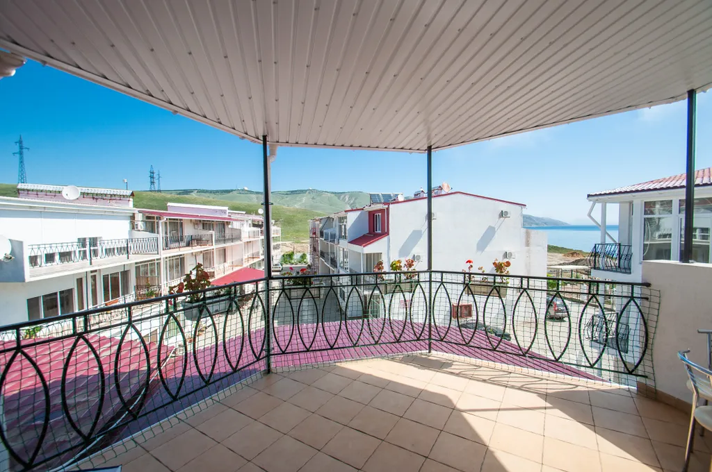 Апартаменты с террасой и боковым видом на море астра 5