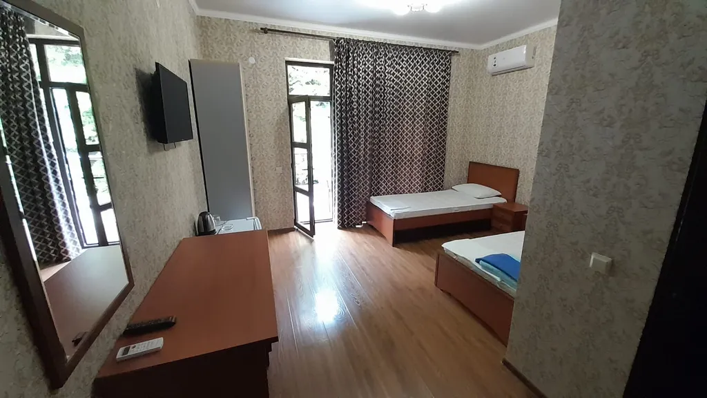 Номер Делюкс с 2 отдельными кроватями, балконом и видом на море