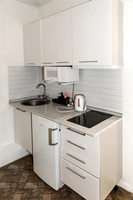 Уютная студия в центре города в стиле лофт