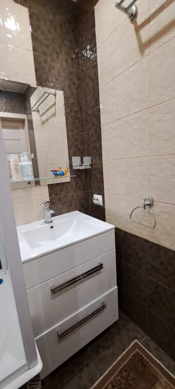 Уютная трехкомнатная квартира с обеденной зоной и двумя спальнями