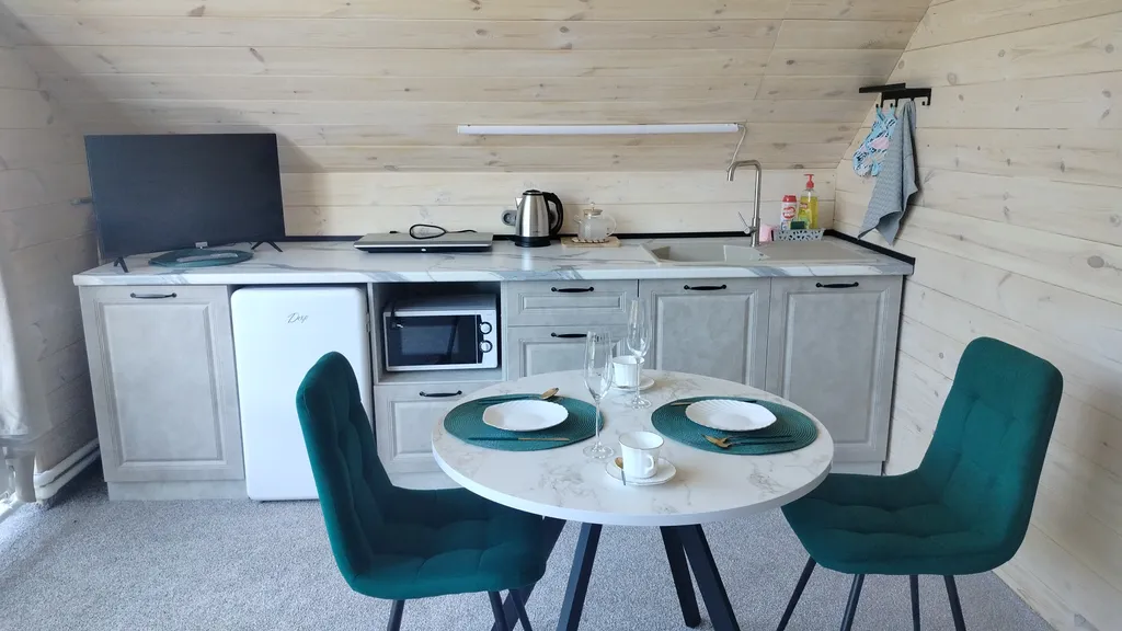 Апартаменты Романтика с панорамным окном в мансарде дома