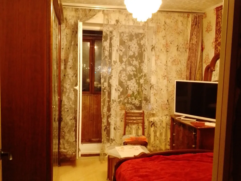 Уютная комната в трёхкомнатной квартире