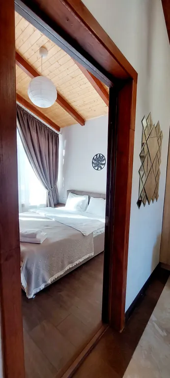 Коттедж Трёхкомнатные апартаменты с видом на горы — Архыз