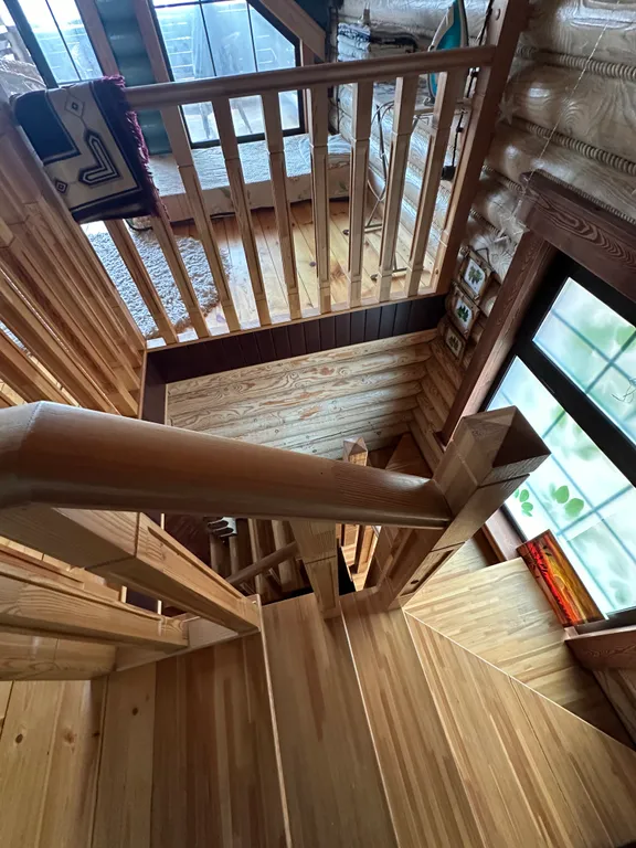 Дом из бруса на берегу моря с зоной барбекю и собственной парной