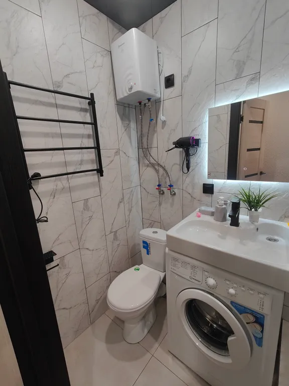 Квартира Уютная студия напротив университета и парка в центре Нефтяников — Омск