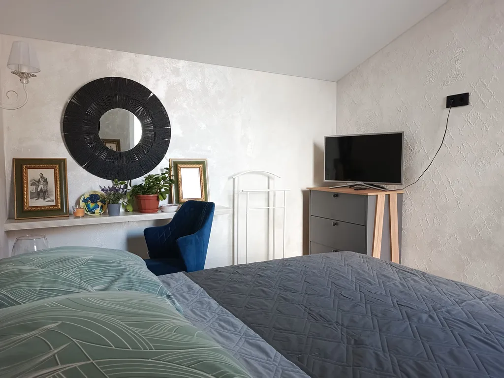 Атмосферная двухуровневая квартира с видом на Петропавловский парк