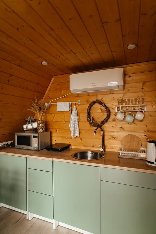 Треугольный дом