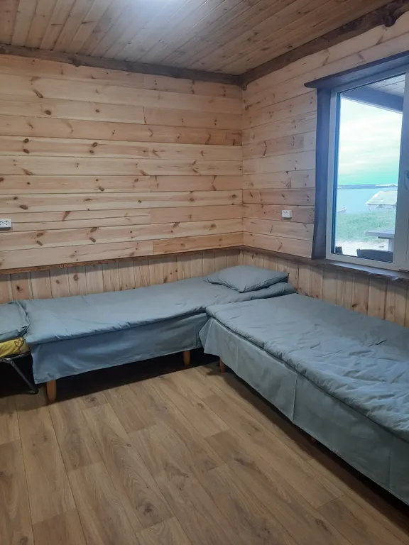 Уютный чистый дом с верандой на берегу реки Варзуга