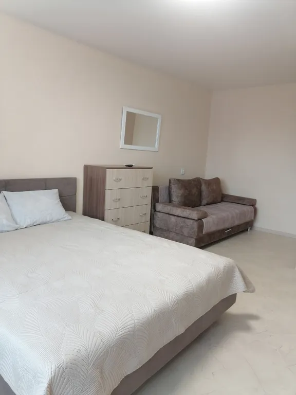 Уютная квартира с детской площадкой во дворе