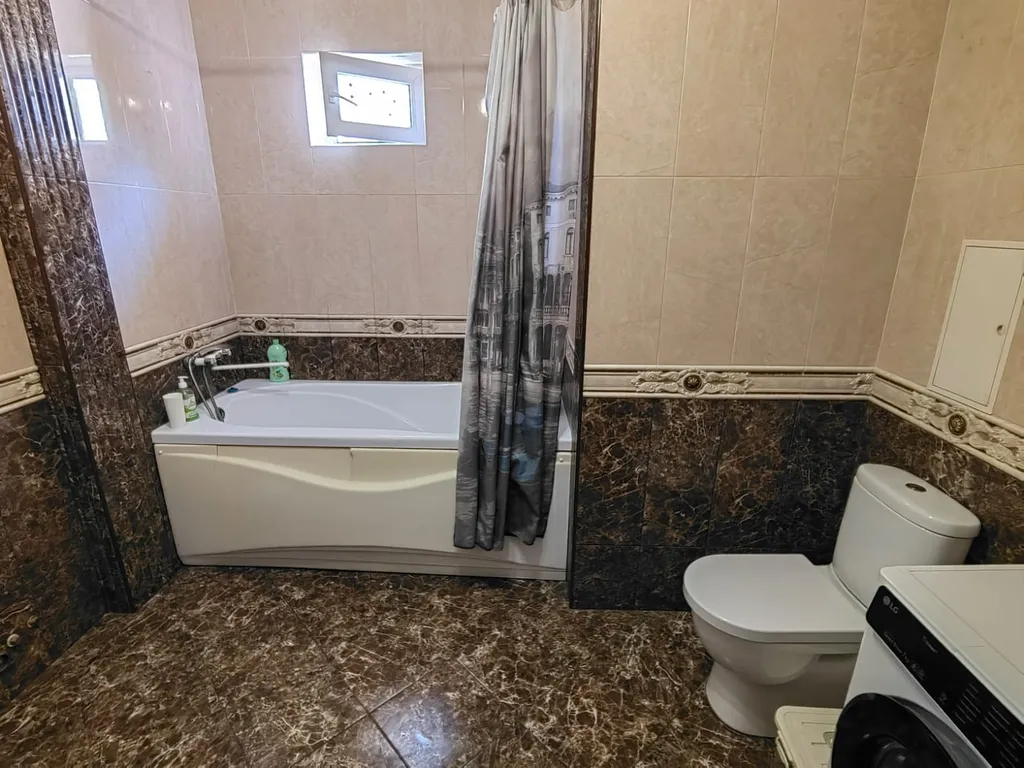 Уютная студия с отдельной спальней в тихом районе приморья