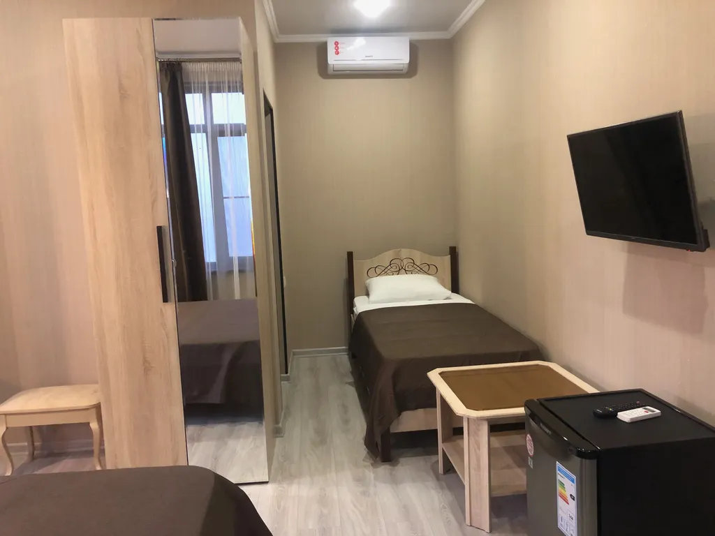 Трёхместный номер с личным балконом