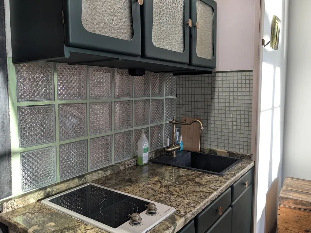 Уютная двухуровневая квартира-студия в доме XIX века