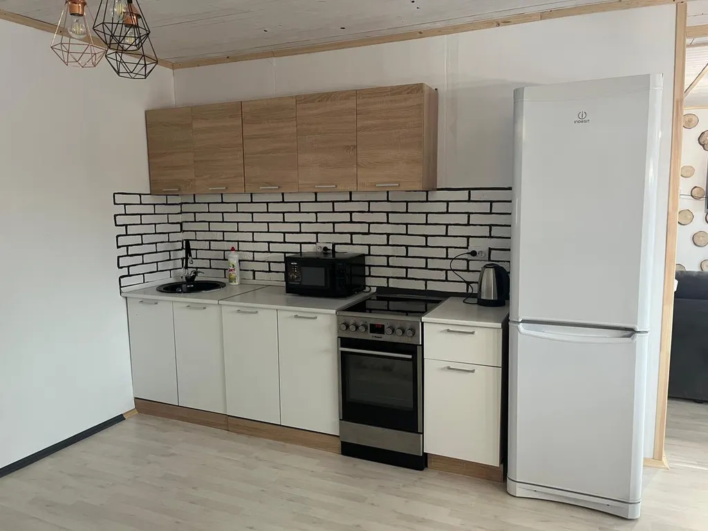 Коттедж с панорамными окнами и видом на горы