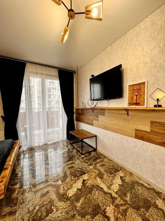 Студия с дизайнерским ремонтом