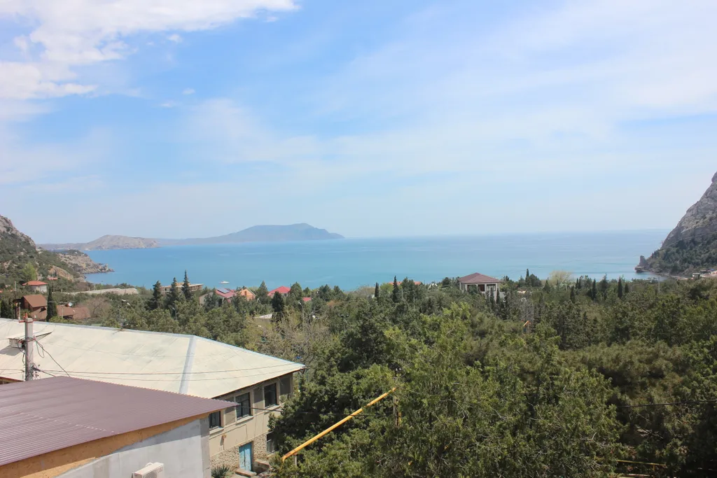 Номер с видом на море и горы