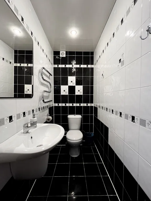 Двухместный номер с 2 отдельными кроватями и общим санузлом