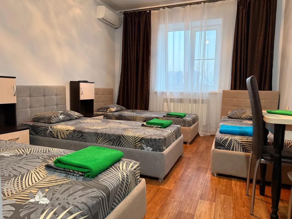 Квартира Четырехместный номер с 4-мя односпальными кроватями — аренда посуточно в Астрахань