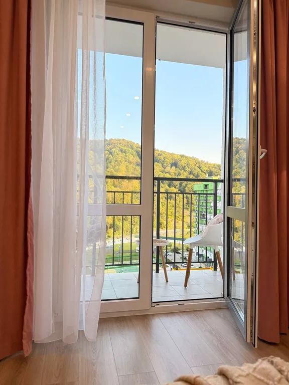 Уютная студия с прекрасным видом на горы.