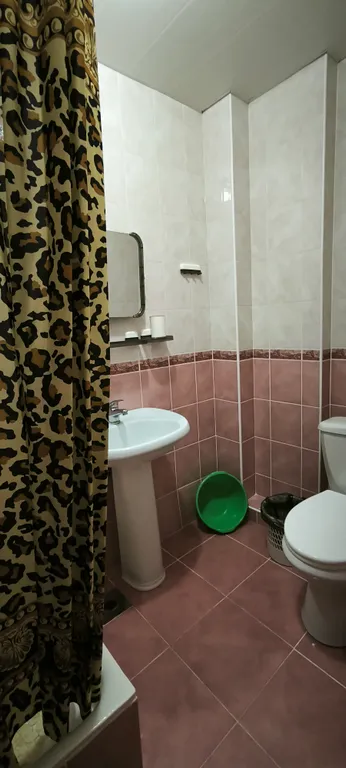 Трехместный номер с удобствами в мансарде