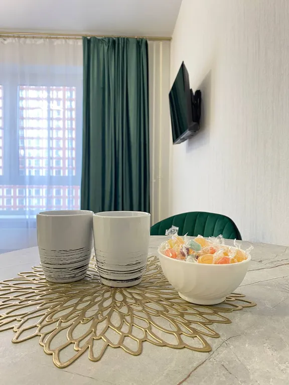 Уютная студия с дизайнерским ремонтом