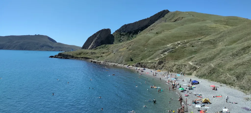 Апартаменты у моря с большой террасой, панорамным видом на море и горы