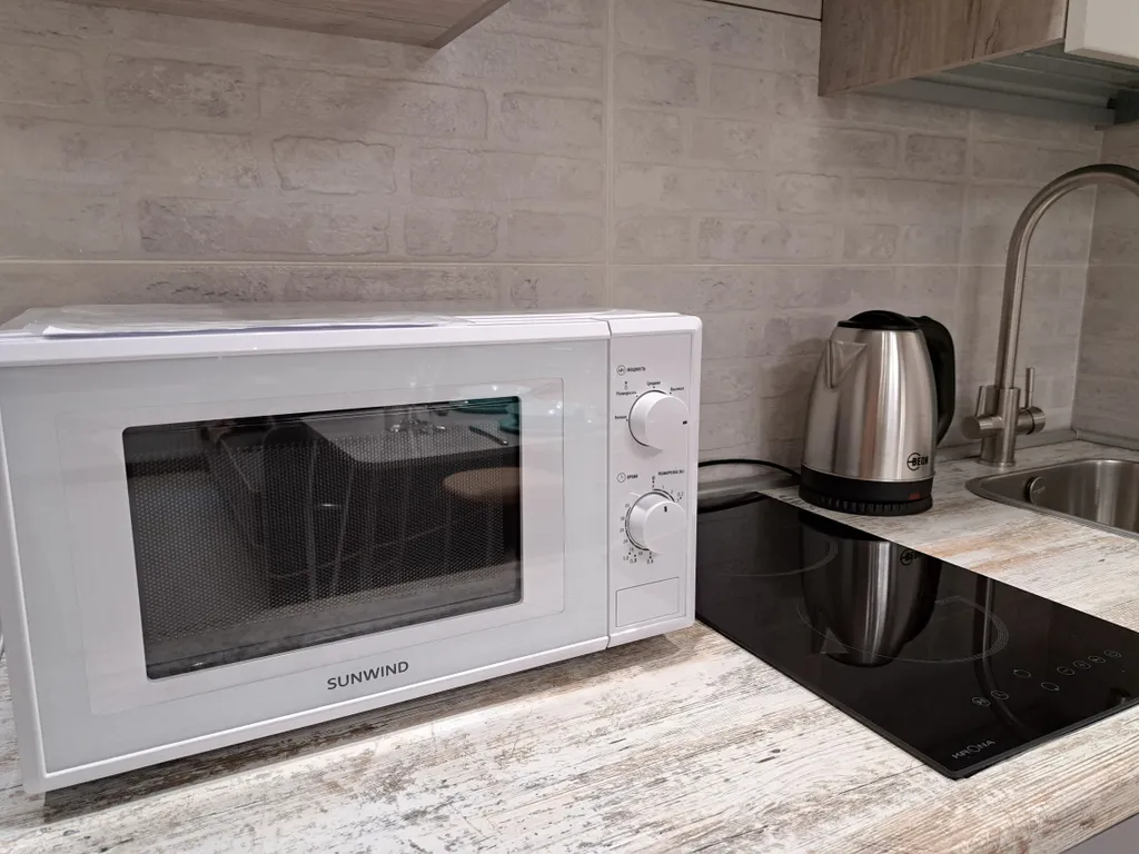 Стильная и уютная двухъярусная студия