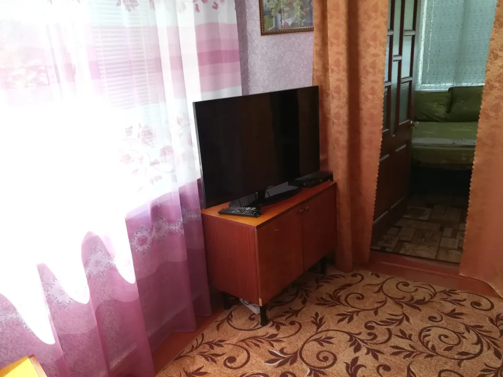 Утопающий в зелени уютный дом