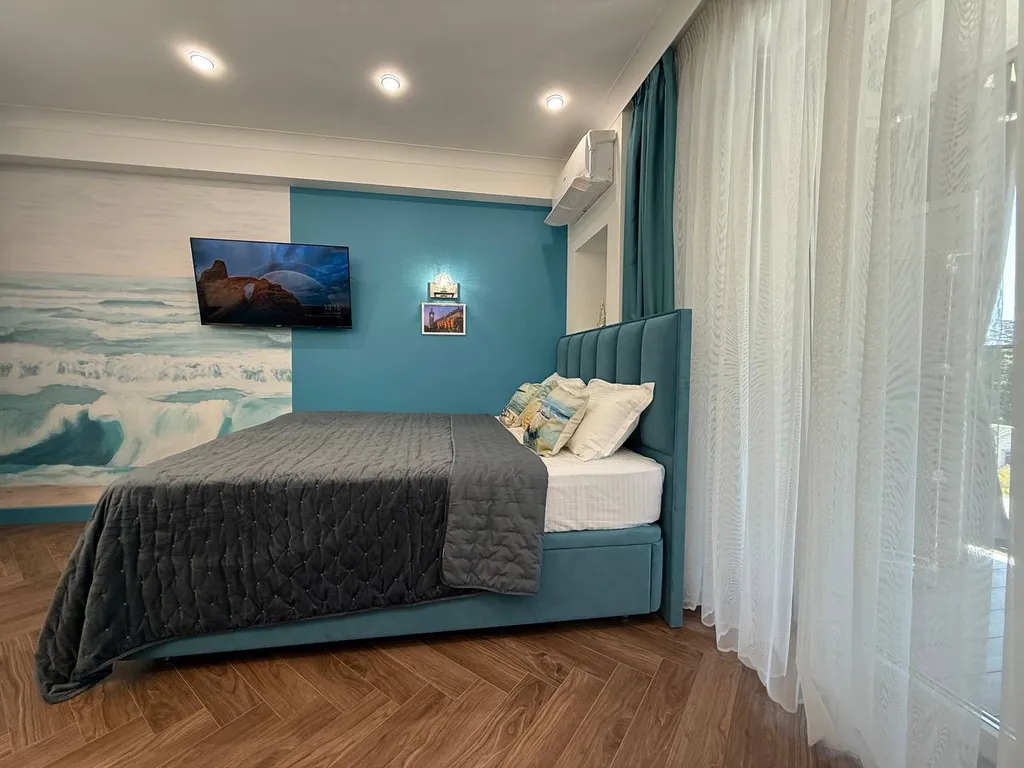 Морская симфония - уютная студия с видом на море и открытым бассейном