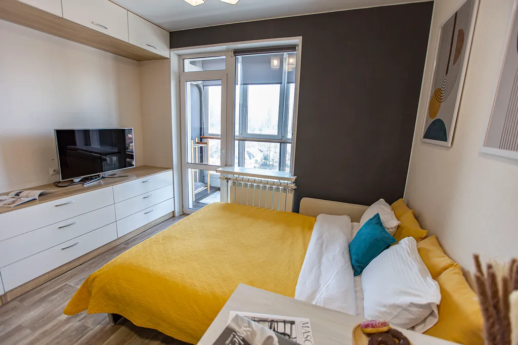 Уютная студия с красивым балконом