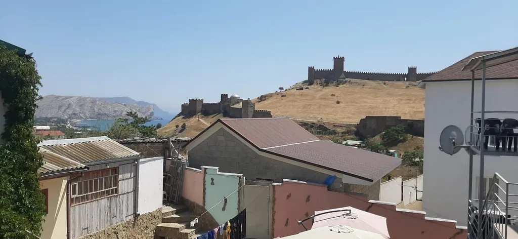 Двухкомнатный номер с видом на Генуэзскую крепость